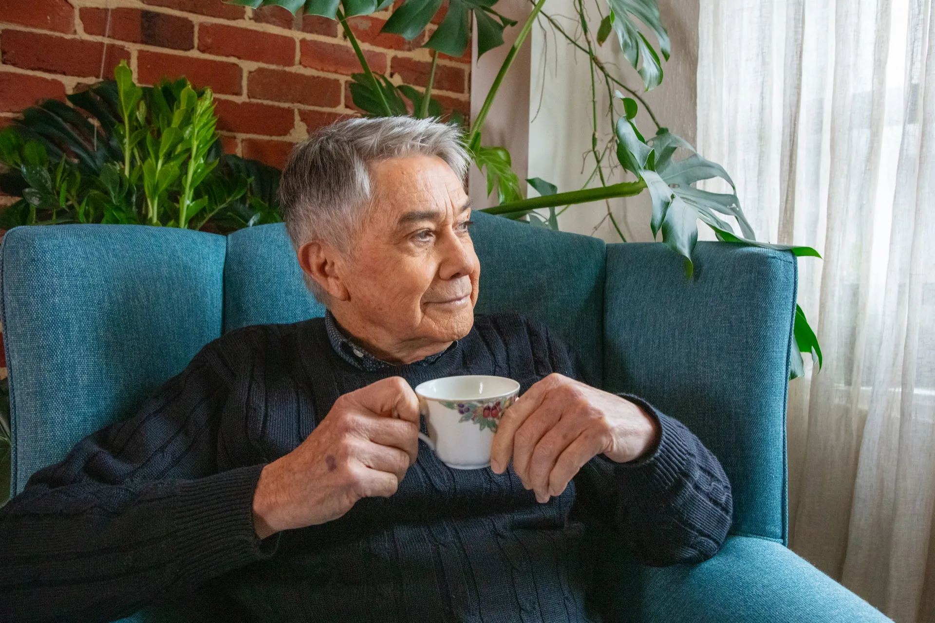 Patient relaxing at home after telehealth consultation