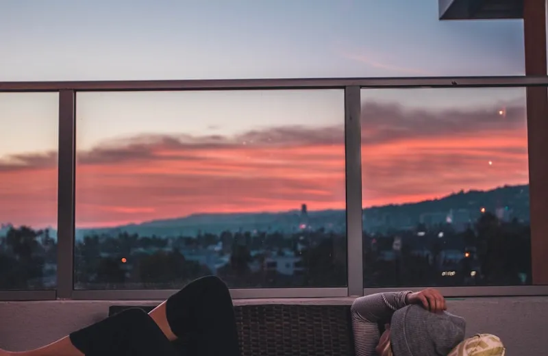 Woman lying relaxed and comfortable on sofa