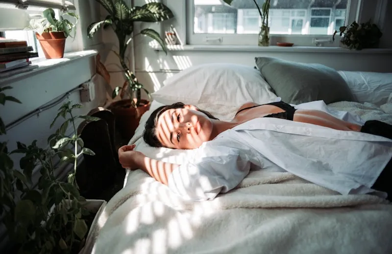 Woman resting peacefully in soft natural light